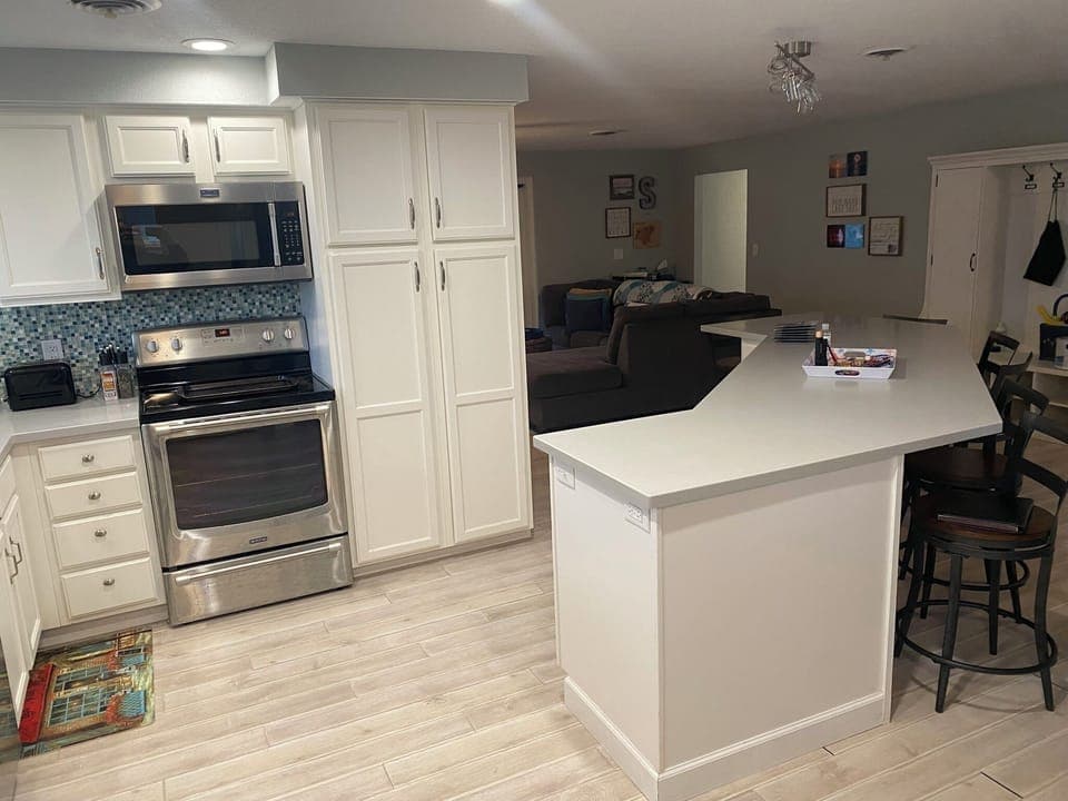 Full kitchen with large island for serving or dining. 
