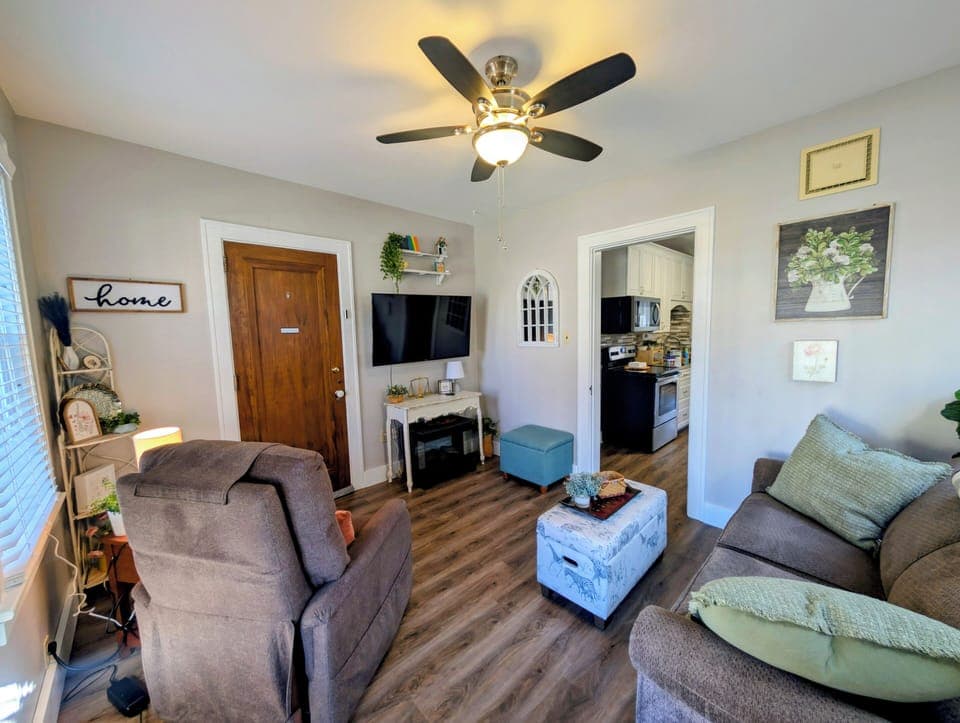Living room with queen size sofa bed. Linens provided. 