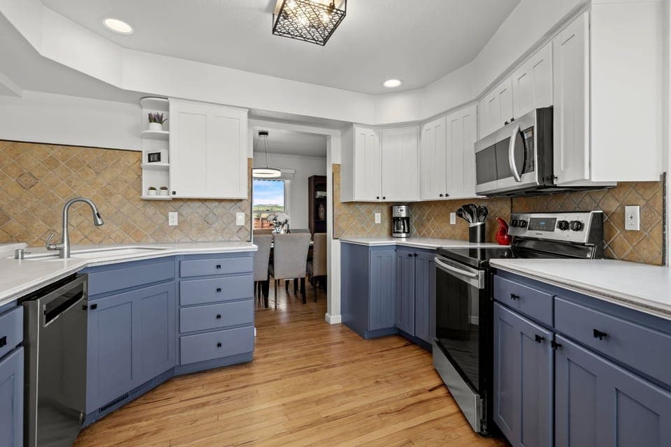 Your spacious kitchen features modern appliances and beautiful granite counters, perfect for preparing memorable meals during your stay.