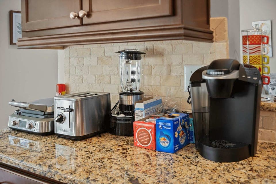 Kitchen coffee station w/ countertop appliances & easy grab-and-go setup