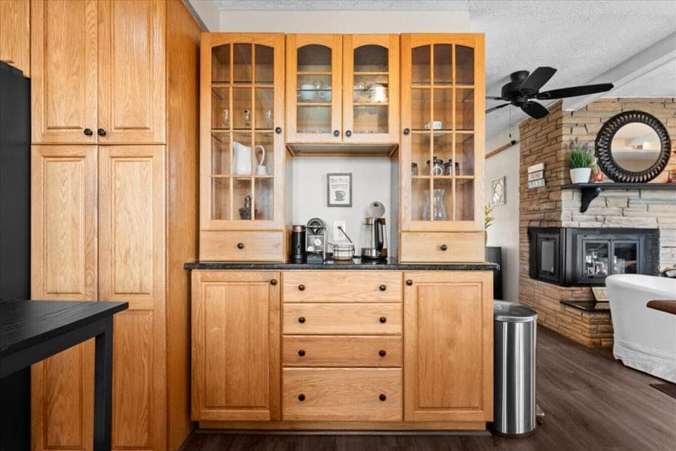 Built in cabinetry perfect for a coffee station or extra storage.