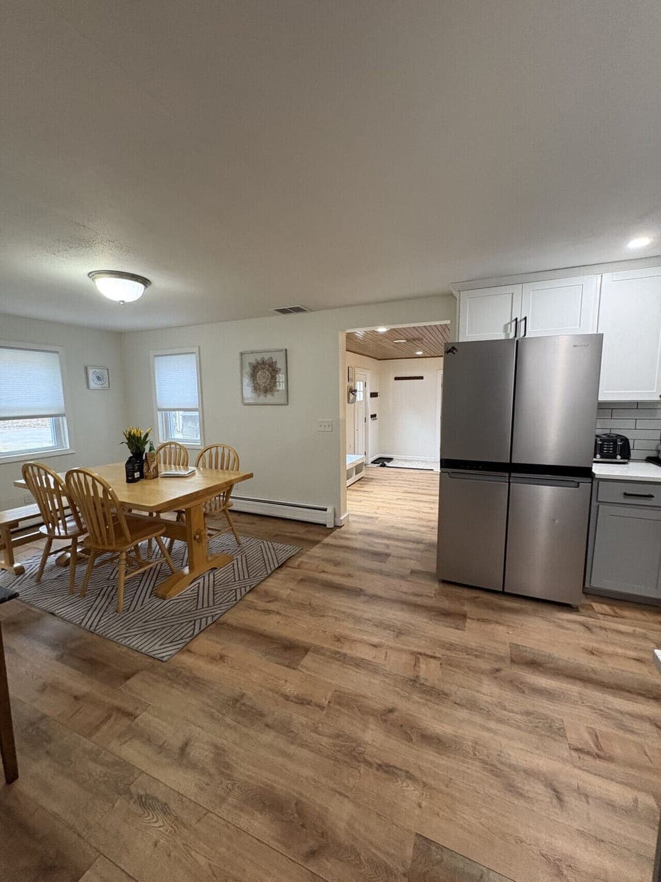 Open dining area connecting seamlessly to the kitchen for easy entertaining