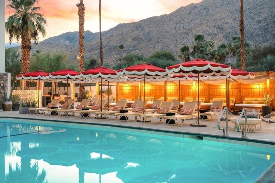 Unwind poolside as desert sunsets glow behind the mountains.