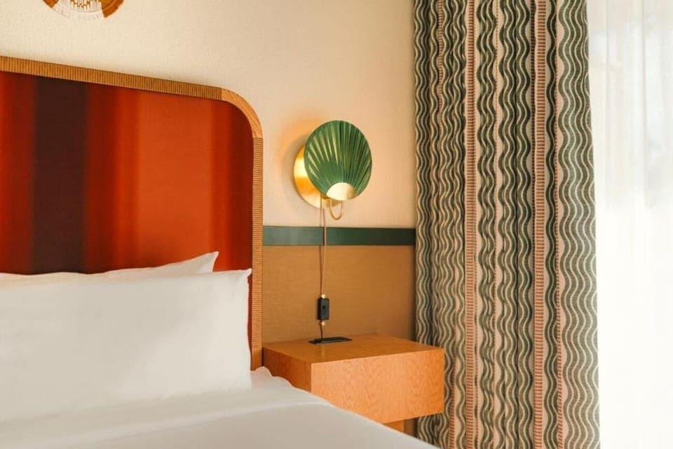 Soak in the boutique details beside the cozy bed corner.