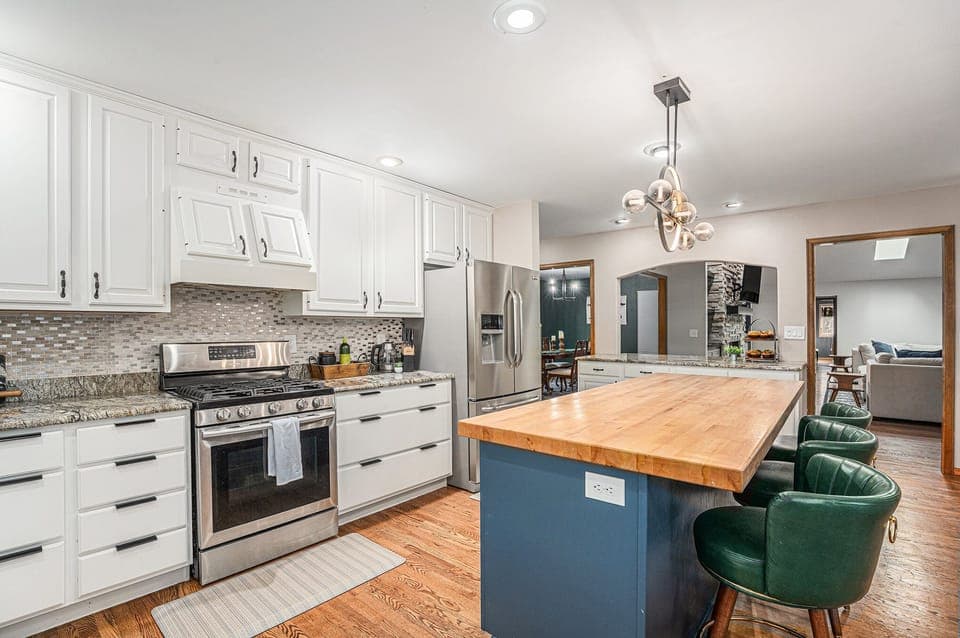 Gather around the spacious kitchen island to cook, snack, and share stories, all while enjoying a bright, modern space designed for effortless meals and meaningful moments together.