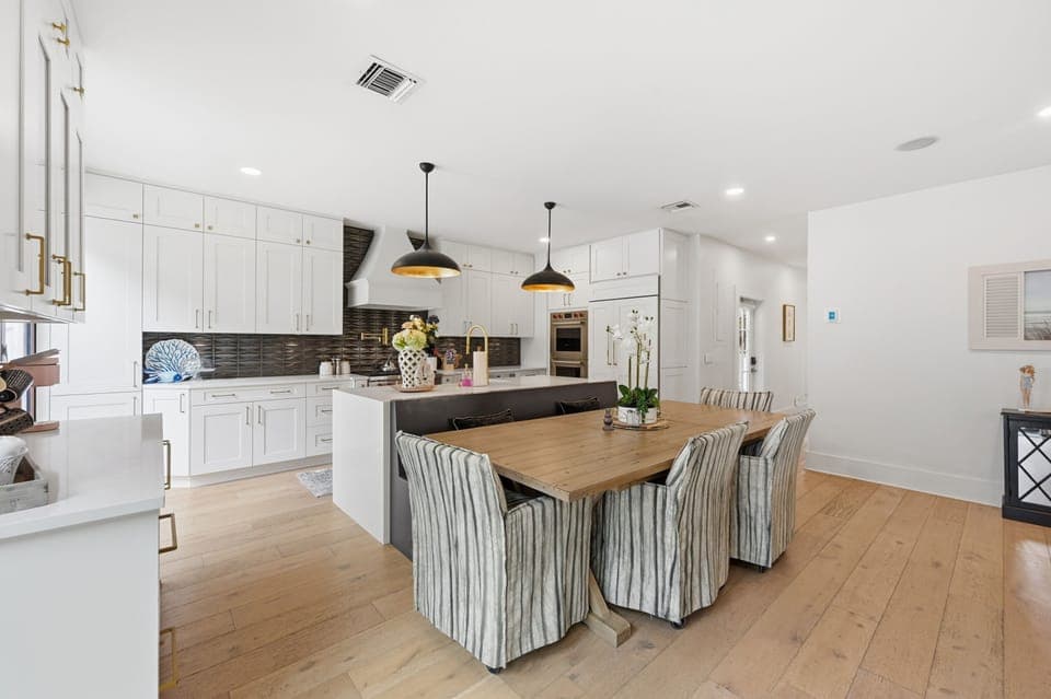 Hallway leads into the kitchen and family room