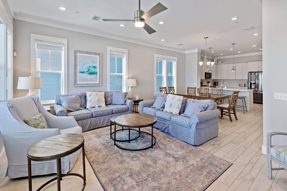 Sink into plush coastal comfort with panoramic sea views filling every window of your open-concept retreat.