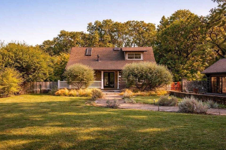 Serene Calistoga retreat set on a sunlit, expansive lawn - perfect for slow mornings, peaceful garden views, and effortless wine country living.