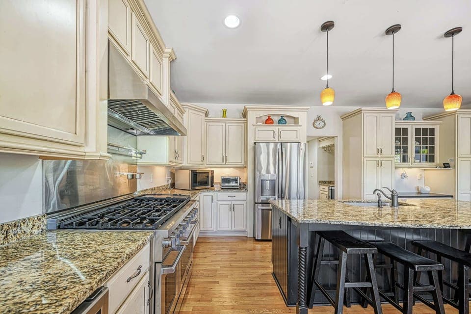 Kitchen - Detail of the island and counter space, plenty of room for a crowd of cooks.