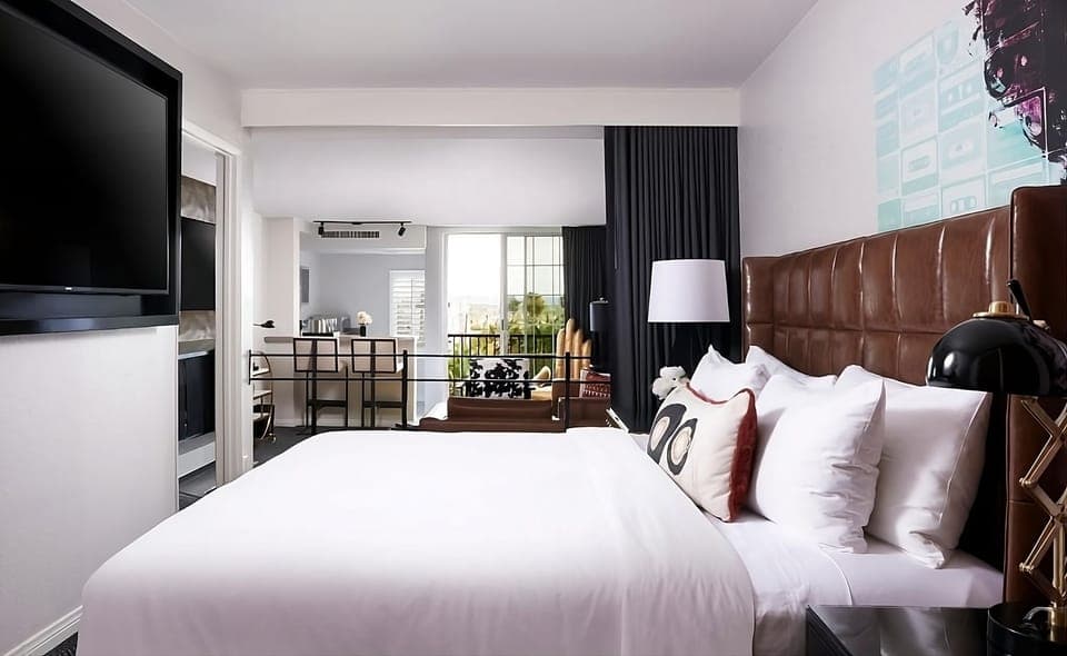 Wake up refreshed in a sunlit room with balcony views.