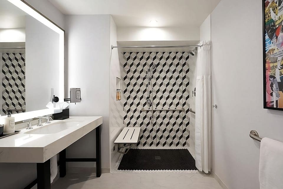 Refresh in a bright, accessible bathroom with walk-in shower.