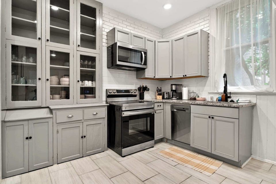 Kitchen: Fully loaded, fully stocked, fully ready for whoever's pretending to be the group chef.