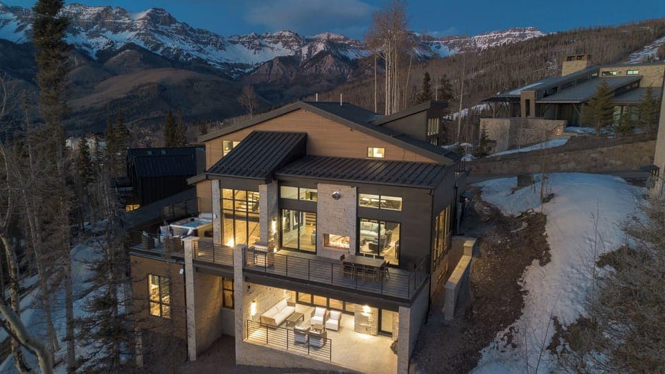 An exceptionally crafted luxury residence perched on a hill. The ideal setting for summer and winter stays.