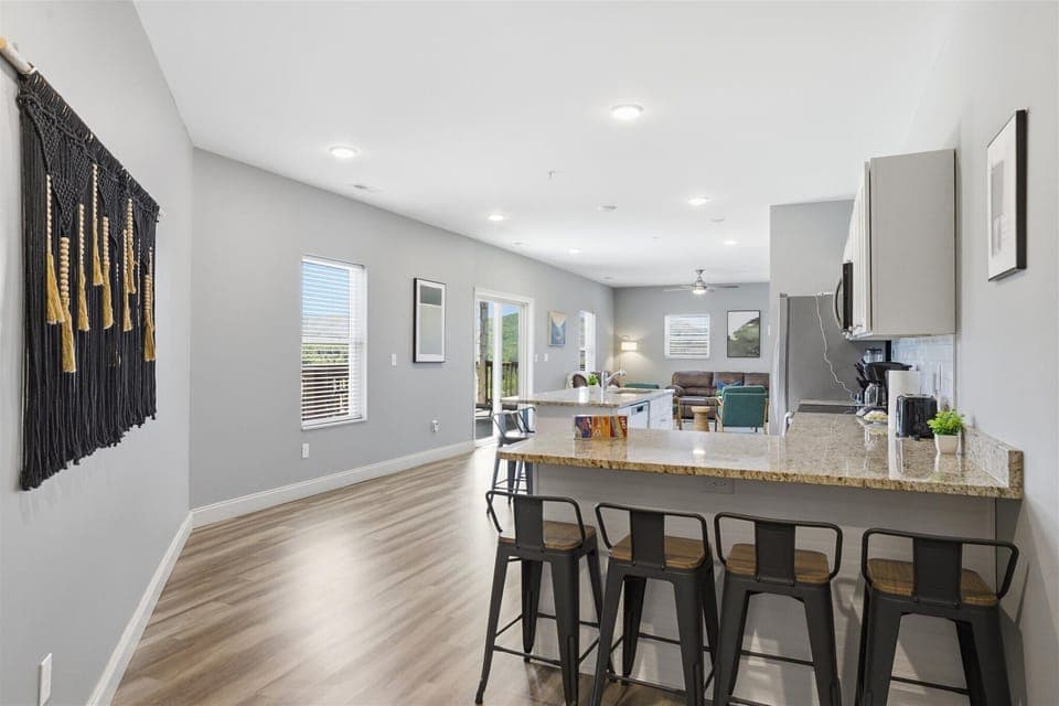 Don’t miss the second setup—another four seats means more room to gather, spread out, and stay connected. No one’s stuck on the sidelines in this kitchen.