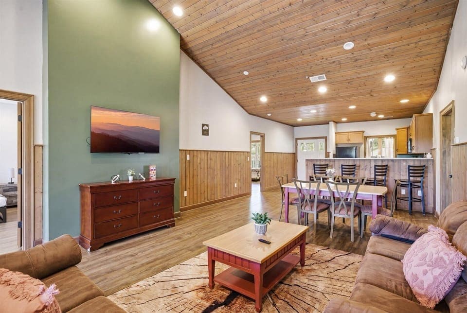The living room invites everyone in with space to gather, stretch out, and settle into the kind of comfort that makes you want to stay a little longer.