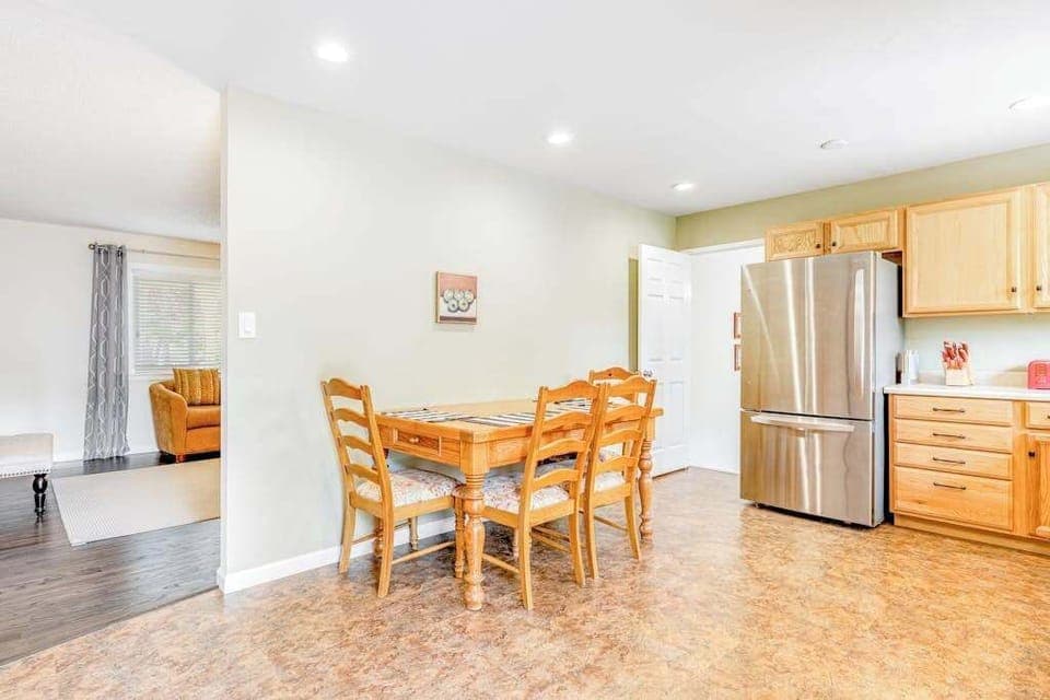 Share farm-to-table meals at your dining table for four — an open layout connects you to the fully equipped kitchen for effortless Kenwood entertaining.