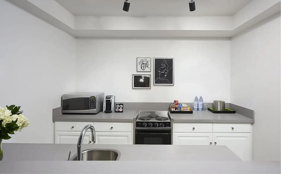 Cook easy meals with a full stove, sink, and microwave.