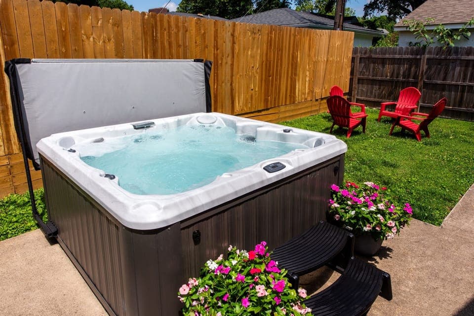 elax in a private hot tub at this charming Louisville home on the Kentucky Bourbon Trail. Enjoy the brick patio and outdoors with a good bourbon! —perfect for unwinding! 