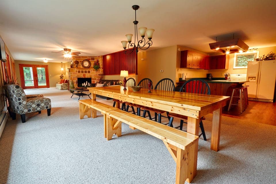 Main dining area. Seating for 8. 4 additional bar stools at kitchen island area.