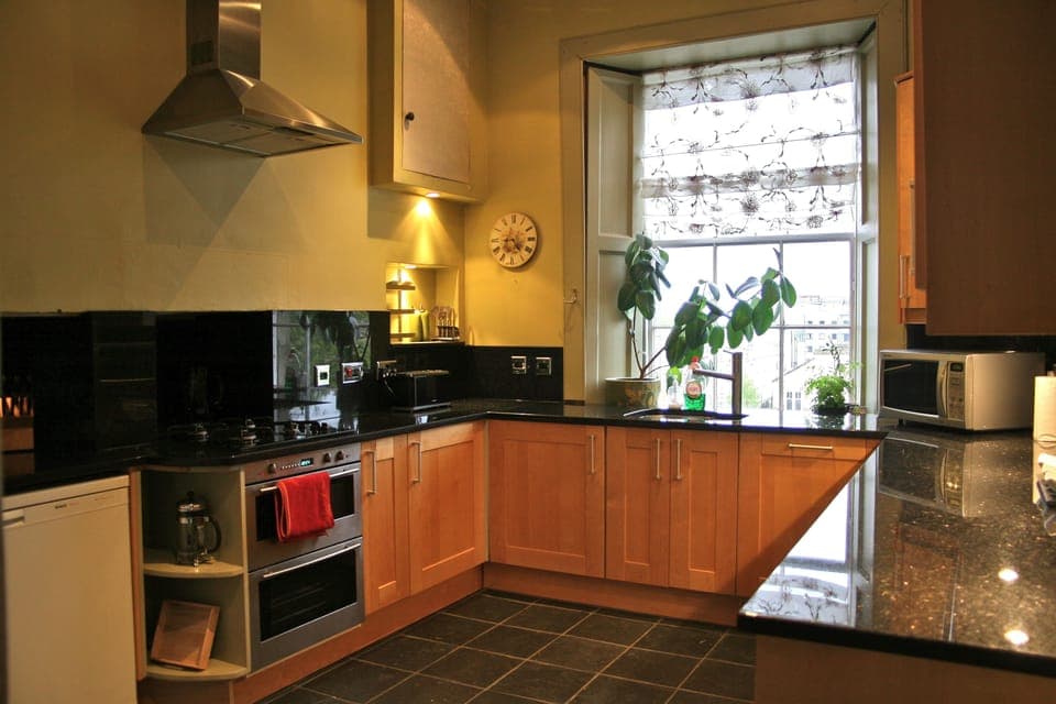 Huge bright kitchen with beautiful views, modern appliances and granite worktops