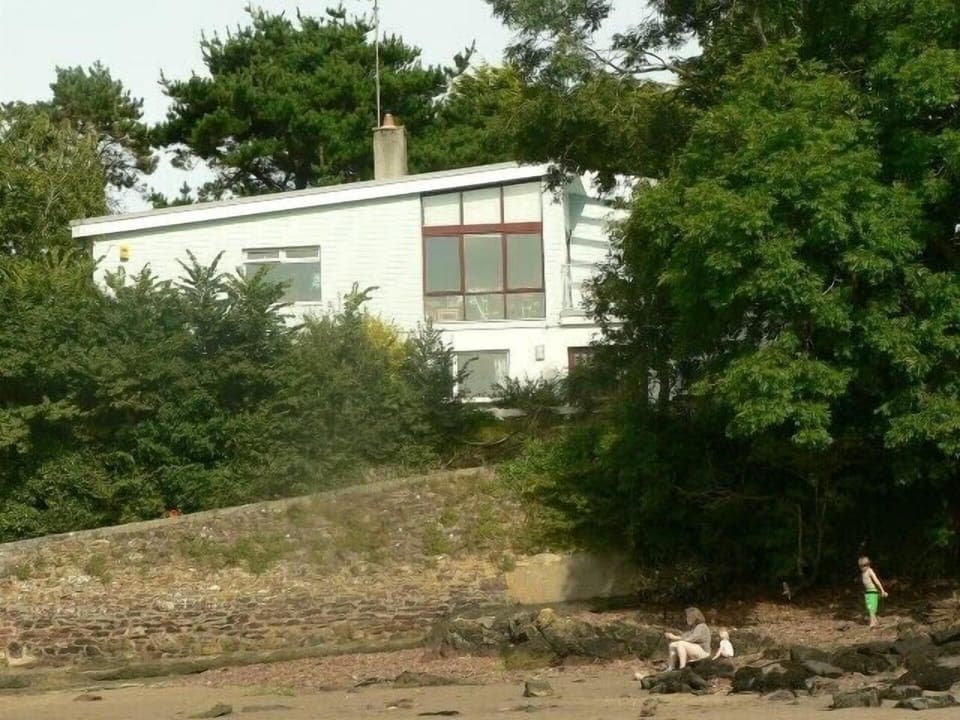 Ferry Cottage overlooks the beach