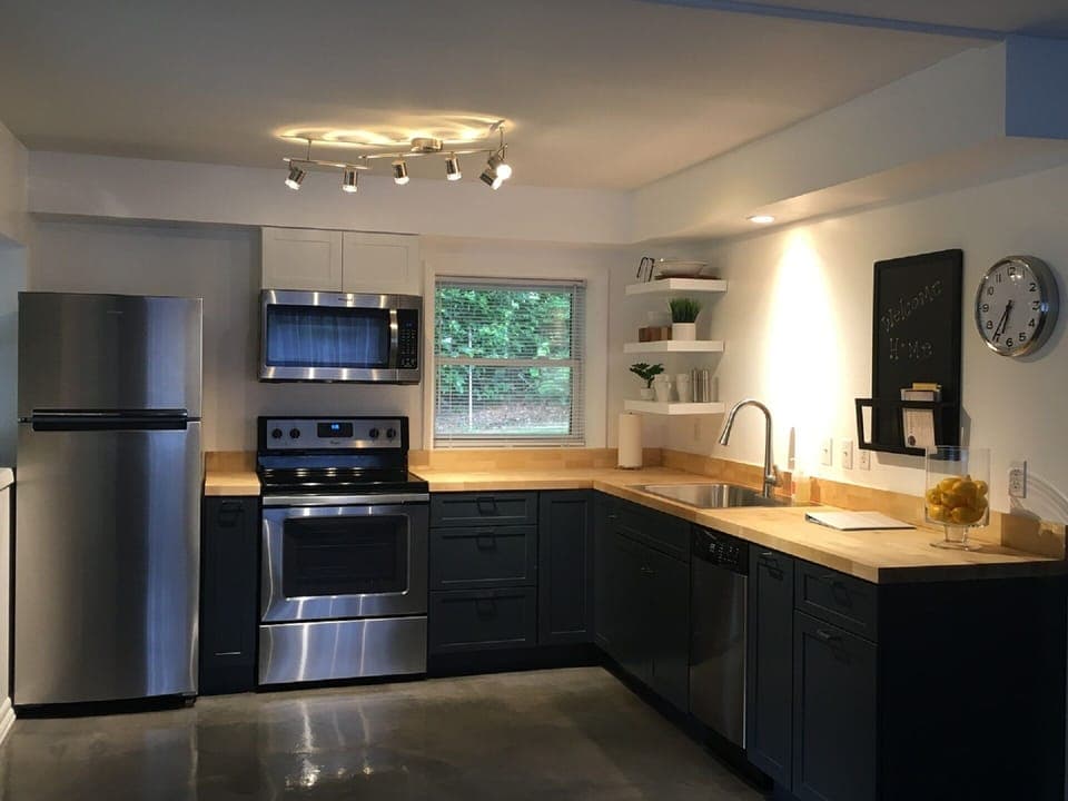 New updated kitchen with all stainless steel appliances, including a dishwasher