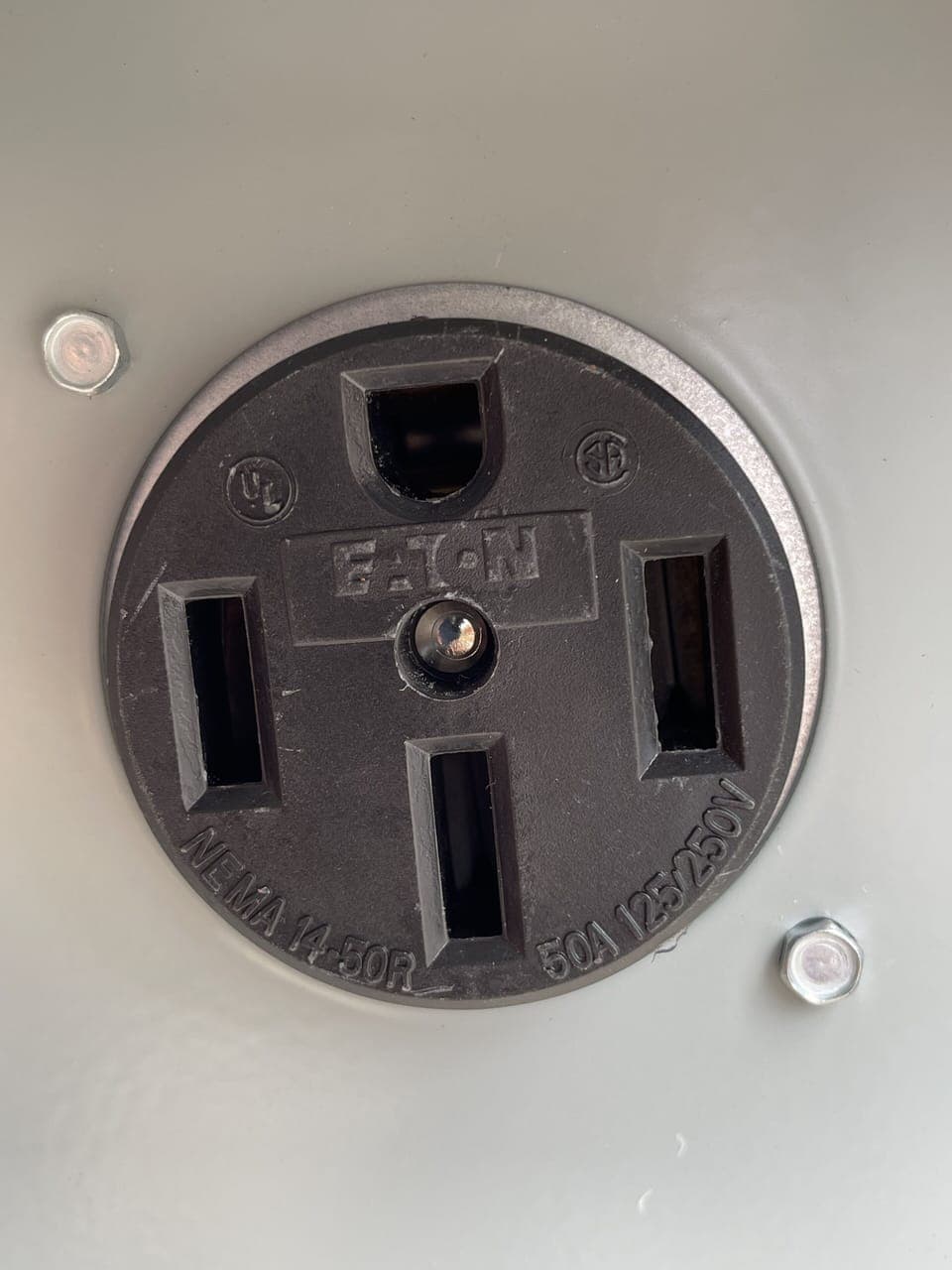 Guest will need to bring their own charging cord that will fit the 14-50 outlet.