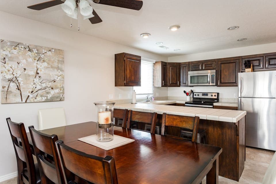 Completely new Kitchen and dining area.  Stainless appliances and bar stools.