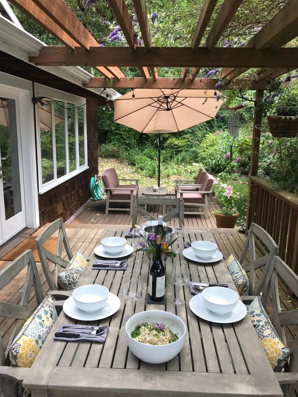 Al fresco dining on the deck! There is also a lovely view of the water. 