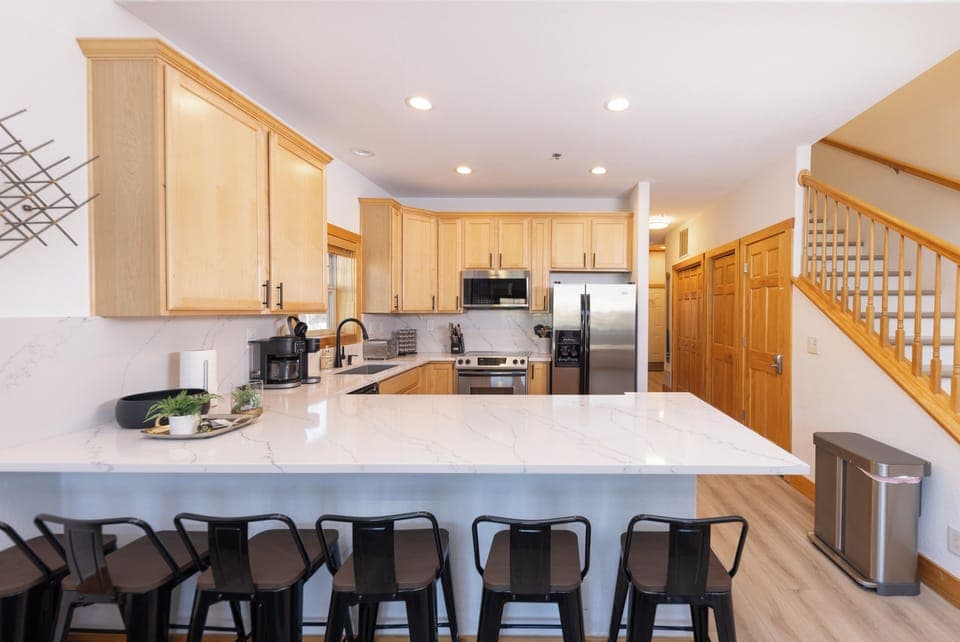 6 seats for dining - easily wrap around corner for additional elbow room. 