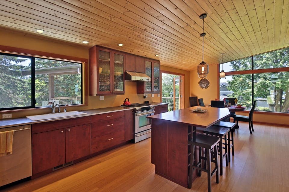 Spacious kitchen with high end stainless steel appliances.