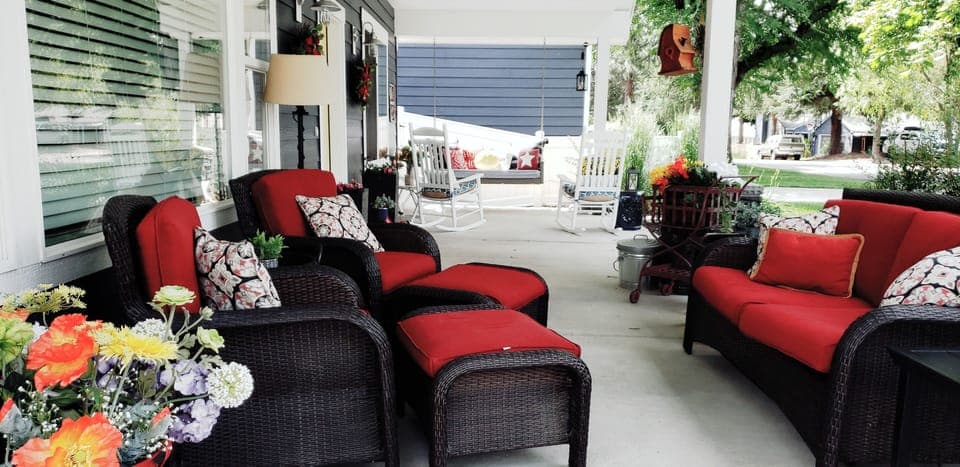 Beautifully appointed covered front porch 