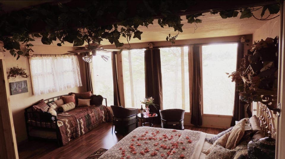 The Nest bedroom with awesome views of the Ozark Mountains