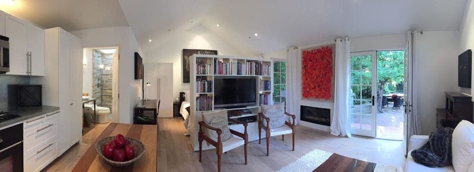 Vaulted Ceiling and Open Floor Concept with French Doors to the Garden Dining and Lounge Area
