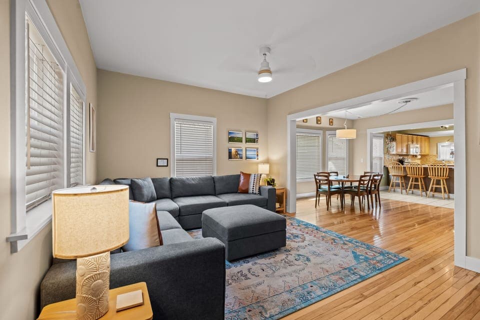 Living room to Dining room. There is a smart TV, DVD player and DVD’s.