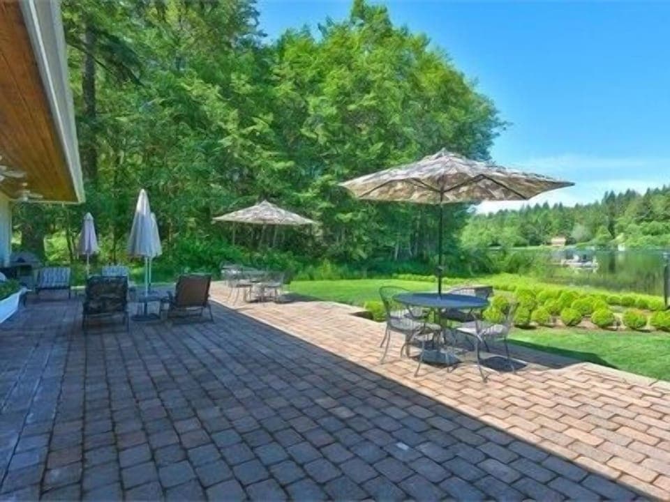 Enjoy sitting outside on the large patio that looks over the lake.
