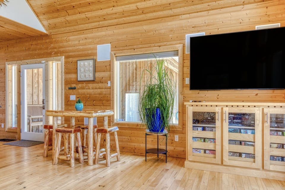 The midsize table by the entryway is the perfect place to play board games