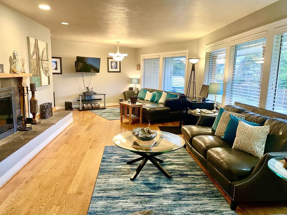 30 ft. living room has 3 couches and room for groups.