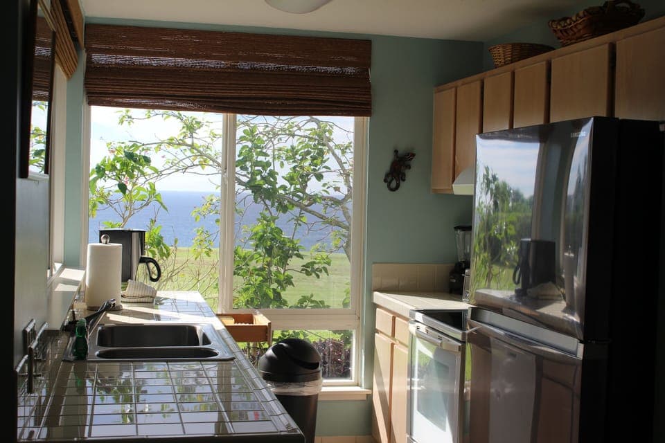 Fully equipped kitchen overlooking the Pacific Ocean. 