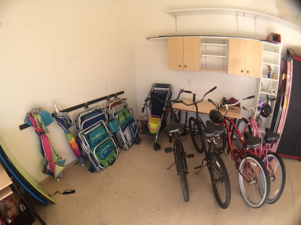 2 beach bikes, chairs, umbrella, cart, boogie boards, beach toys, etc