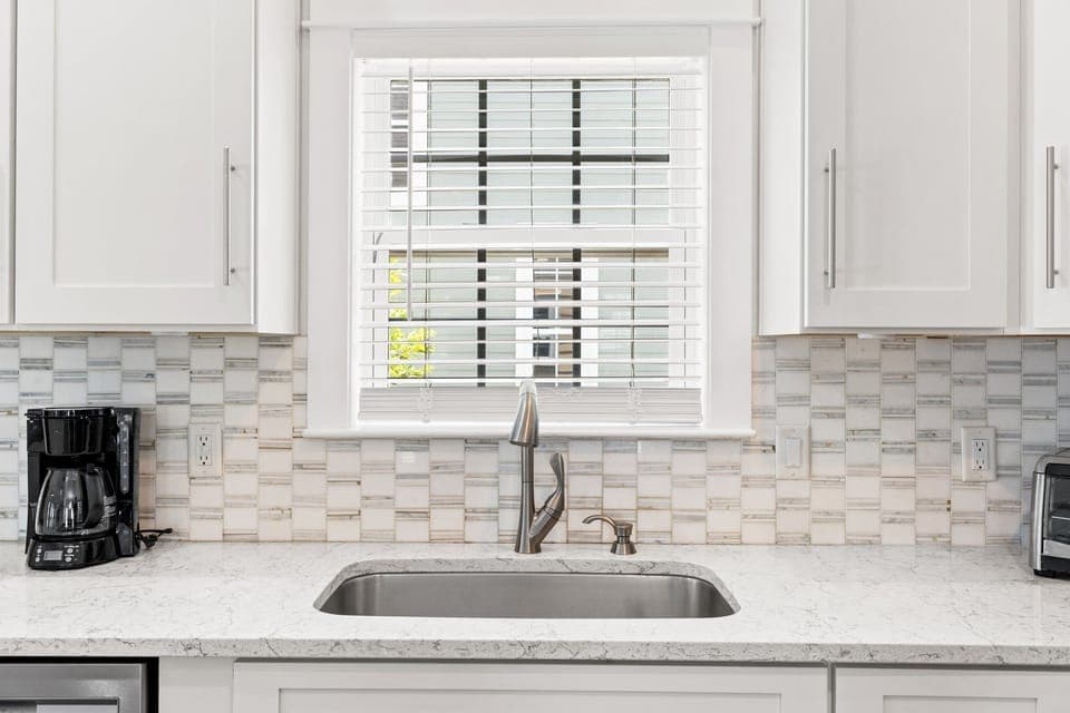 Beautifully updated kitchen with loads of counter space and plenty of dishes, glassware, pots, pans, utensils for a large group.