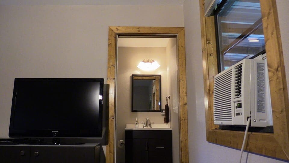 pocket door to the full bathroom