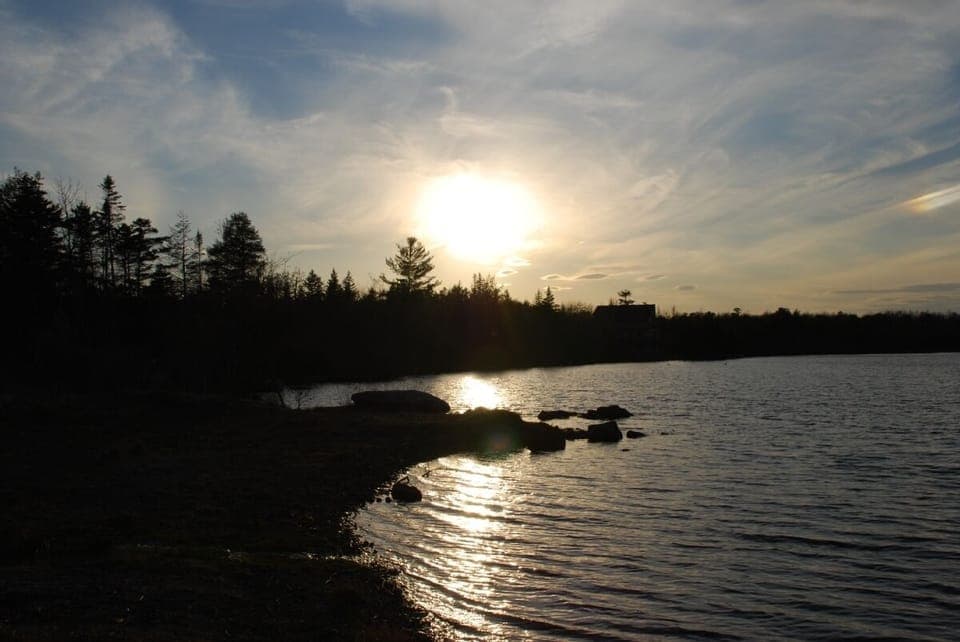 Towamensing Lake at sunset is a close walk from our chalet.