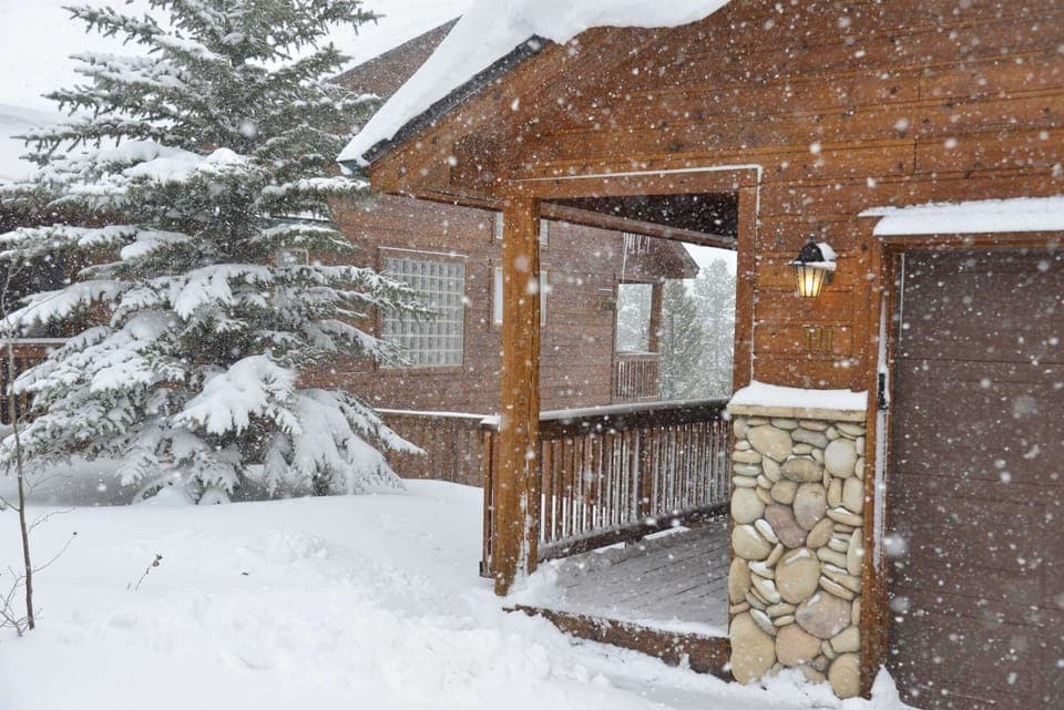 Yes, that is a street-level 2-car heated garage.  And the driveway holds 2 more