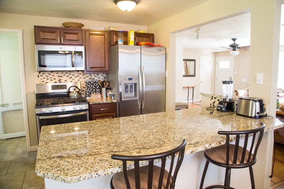 Kitchen with Granite counter tops, Island