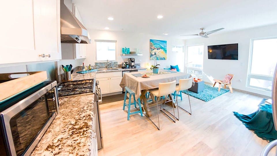 Open floorplan; kitchen and living space.