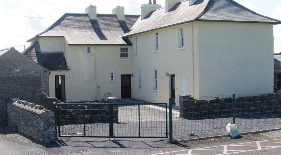 Ample parking in enclosed courtyard at rear. Safe for children and/or pets.