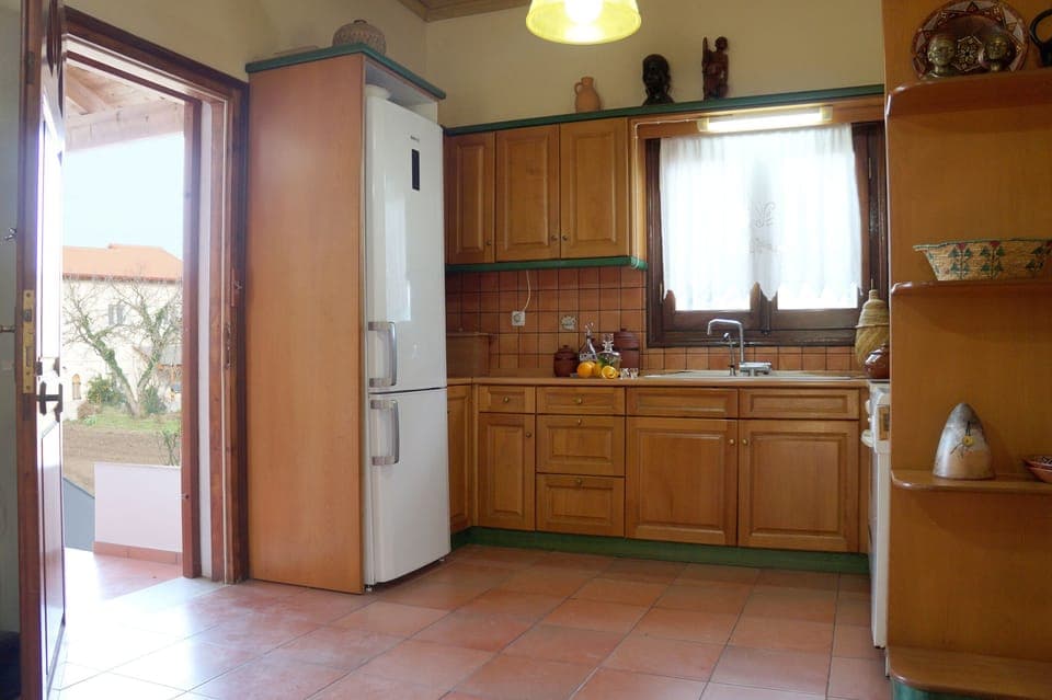 Our kitchen; the sink, cooker and refrigerator (among others) can be found here