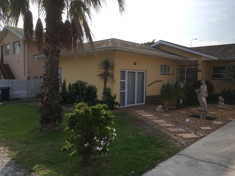 Front of our house and entrance to the apartment