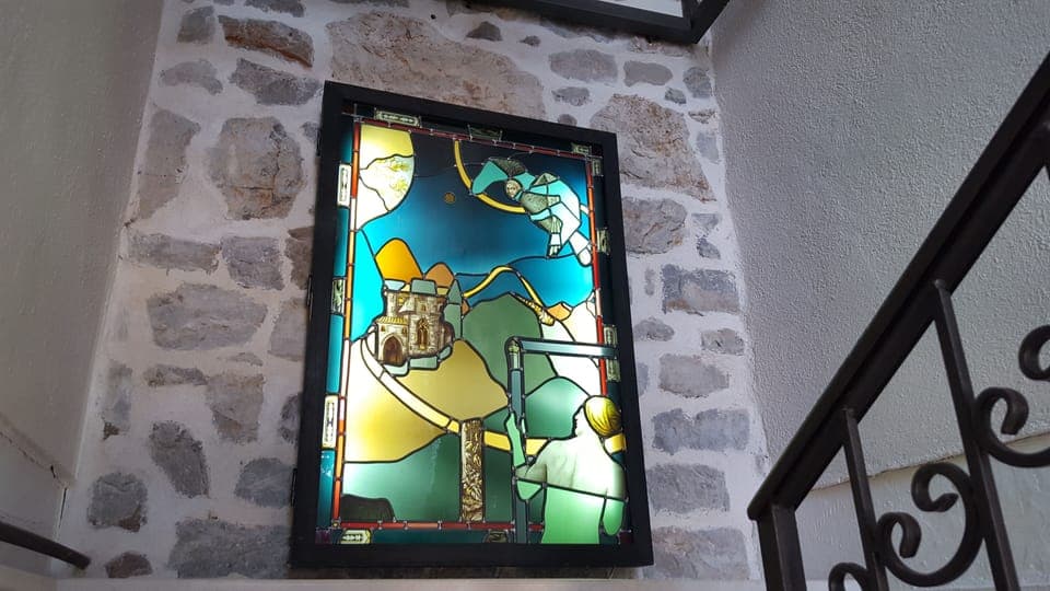 Fine artwork is displayed throughout the house